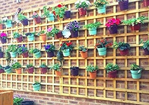 Use garden trellis to hang pots