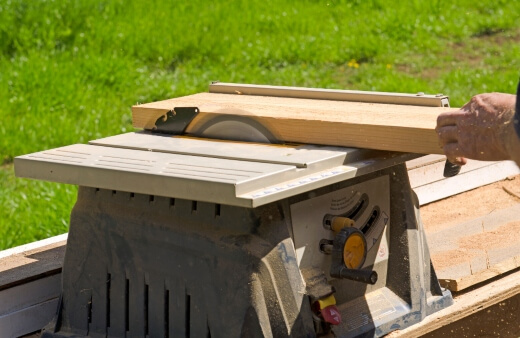 A table saw is a powerful woodworking tool that consists of a blade that is circular in shape and mounted on an arbor that protrudes through a slot in a table