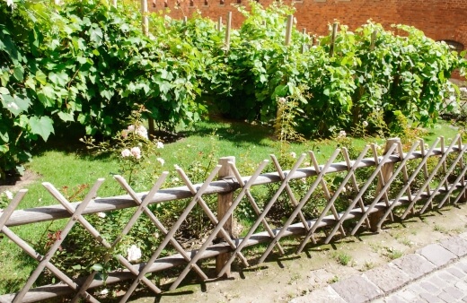 Garden Fencing is available in metal, plastic, and wood