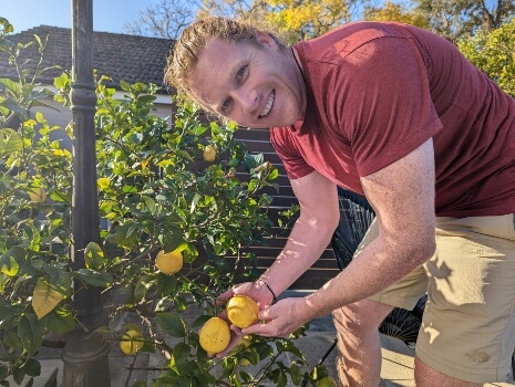 Nathan Schwartz of Aussie Green Thumb harvesting lemons