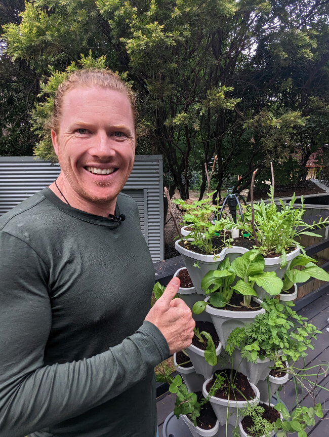 Nathan Schwartz of Aussie Green Thumb giving Mr Stacky Hydroponic Smart Farm a thumbs up