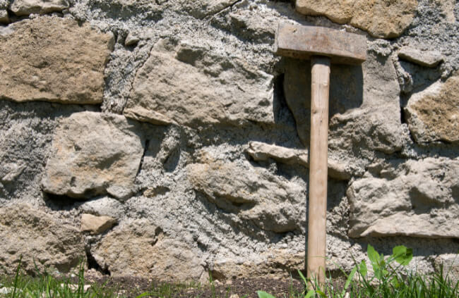Sledge hammer is a useful demolition tool for landscapers
