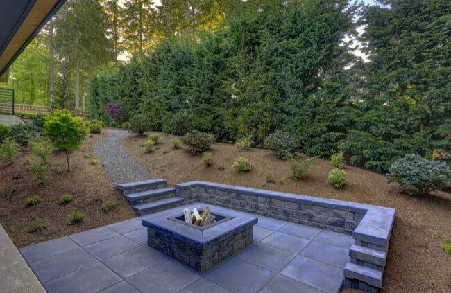 Fire Pit with A Raised Stone Ledge